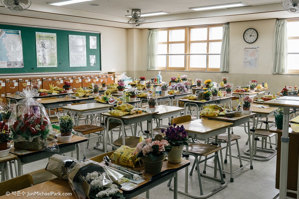 Time stands still at classrooms once occupied by the Sewol student victims. Flowers, treats and mementos are laid on the writing desks of the victims. Empty desks belong to survivors. Out of 325 students onboard, only 75 escaped the capsizing ferry and no one else was rescued.