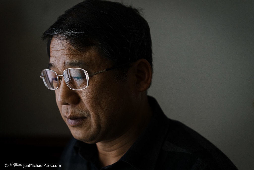 Kim Hyun-dong, another father of a Sewol student victim Kim Da-young, looks pensively at mementos in his late daughter's room.