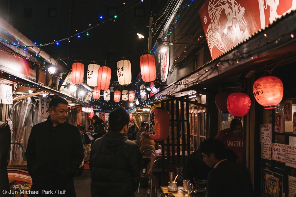 KAGOSHIMA, JAPAN - February 4, 2016: Kagomma Furusato Yataimura is a mock village of food stalls and small restaurants. Its quaint alleyways with colorful lanterns provide a glimpse into authentic Japanese dining experience.