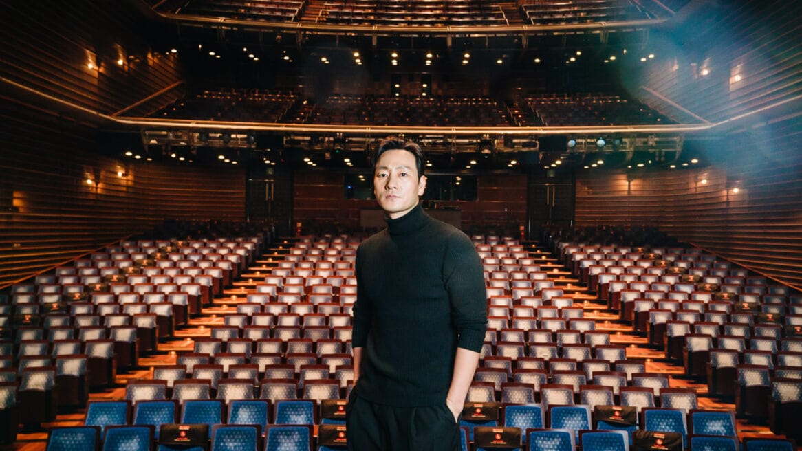 South Korean actor and Squid Game star Park Hae-soo is directed to look straight to the camera by Seoul photographer Jun Michael Park in a portrait setting at an empty theater of the former LG Art Center in Seoul.