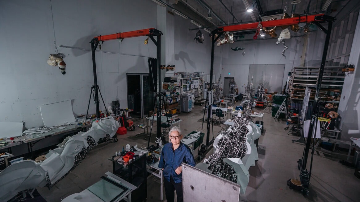 Lee Bul, a celebrated South Korean contemporary artist, looks at the camera at Seoul photographer Jun Michael Park's direction in a portrait setting, at her studio in Goyang.